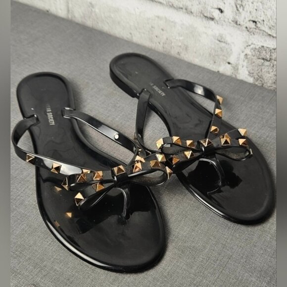 Streetwear Society Black Jelly Flip Flops with Brass Studs on the Bows. - Picture 2 of 9